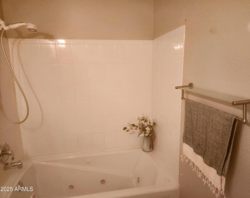 full bath with spa tub
