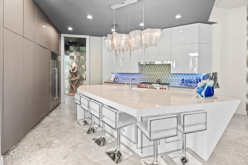 Overhead a 52” chain-design chandelier