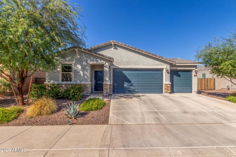 Front of home 3 car garage
