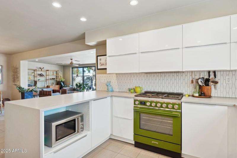 Kitchen opens to the living spaces