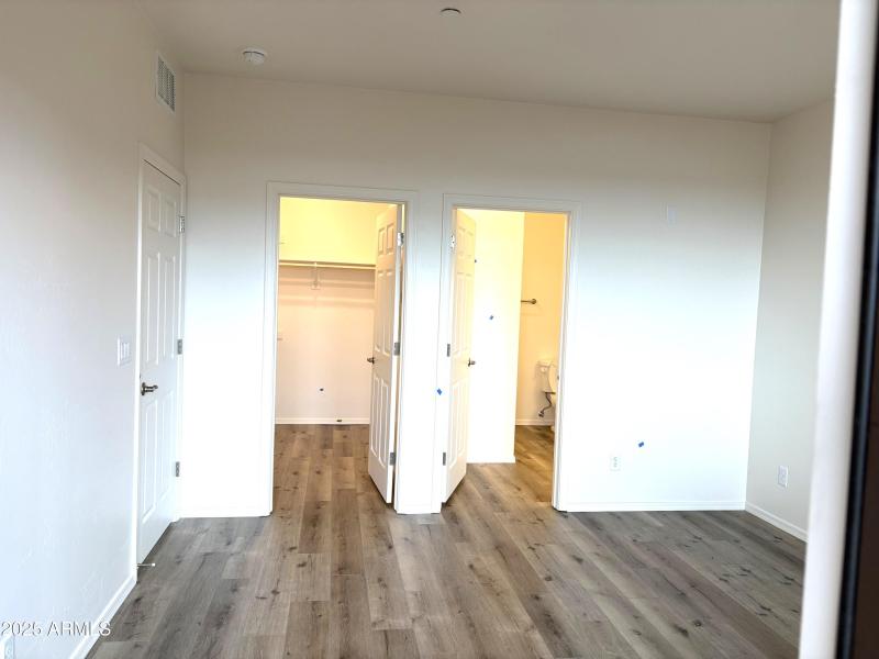 Primary Bedroom with walk-in closet
