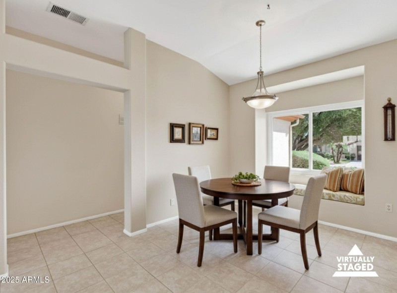 Virtually staged Dining where desk is