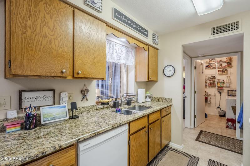 Kitchen with Laundry Rm in Background