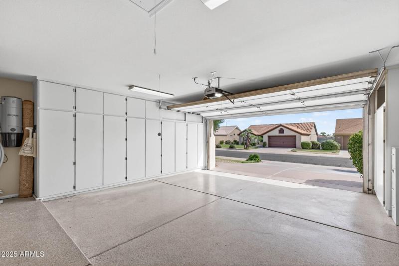 Garage with Storage Whole House Vac.