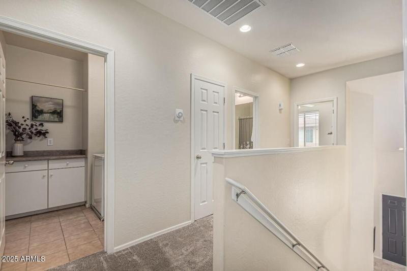 21-Upstairs Landing into Laundry Room