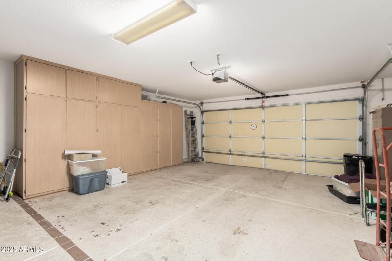 Extended garage with cabinets