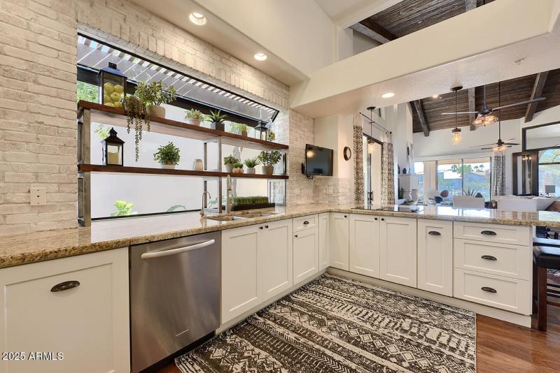 Kitchen Overlooks Manicured Side Yard