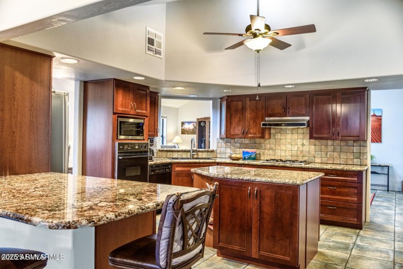 Island kitchen with granite