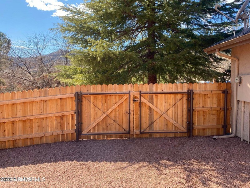 Double gates into side yard