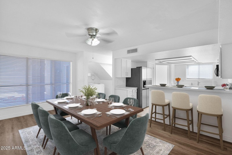 kitchen with bar table furnished