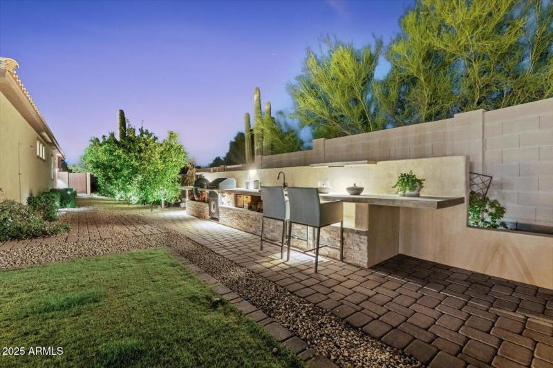 Outdoor Kitchen with Bar Seating