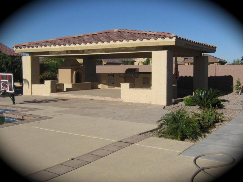 Ramada with outdoor kitchen