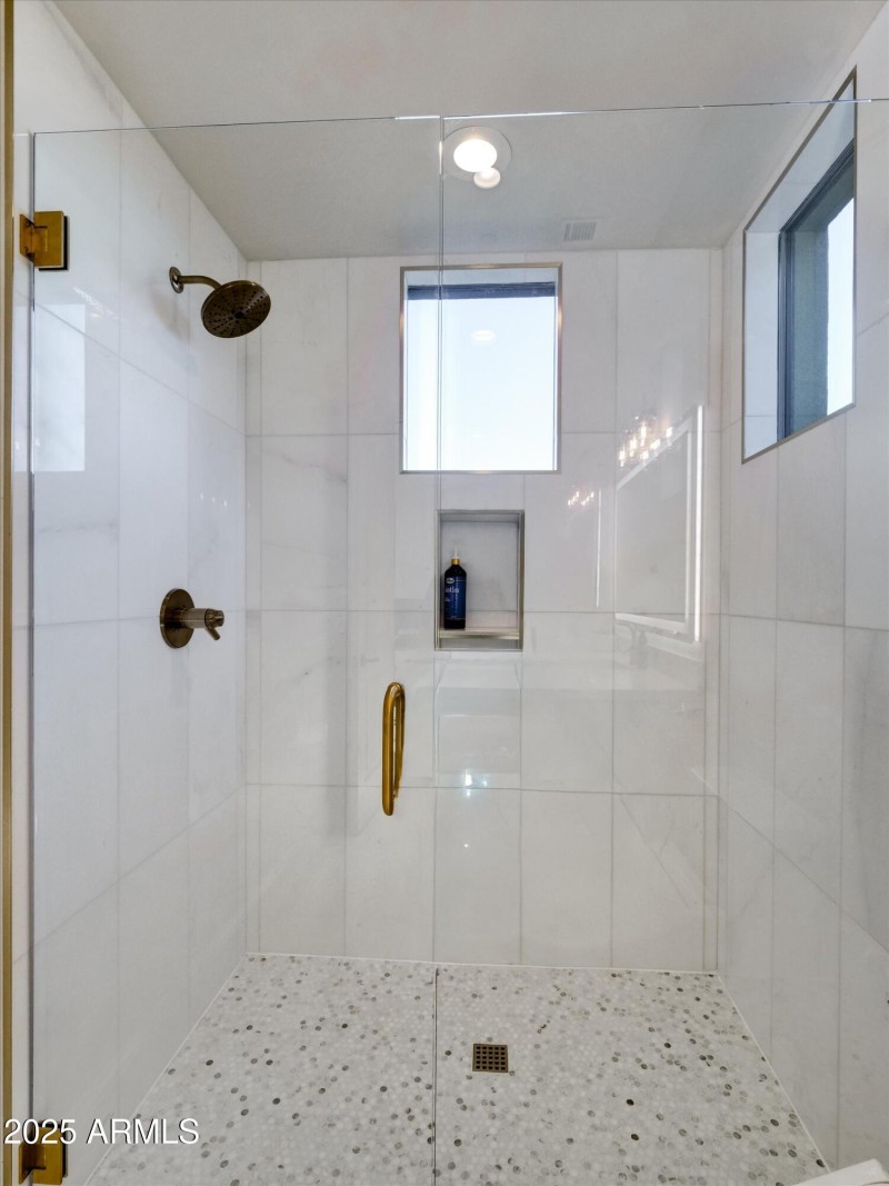 Custom neutral tiles throughout