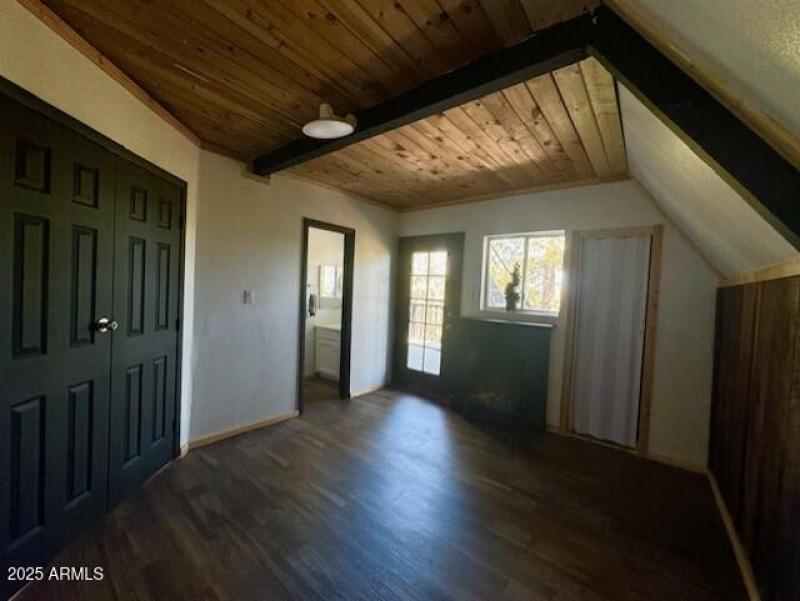 master bedroom with balcony exit