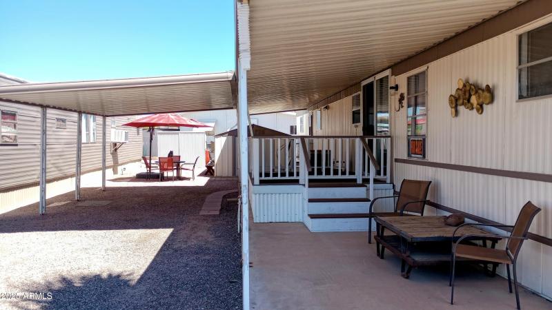 Front- covered patio and Carport