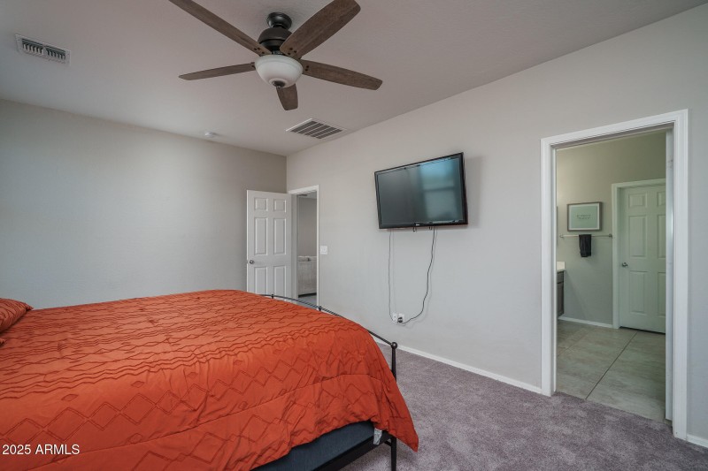 11) PRIMARY BEDROOM