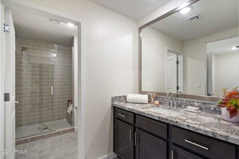 Bath 1 - Granite Counter Storage