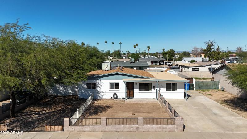 Large fenced front yard