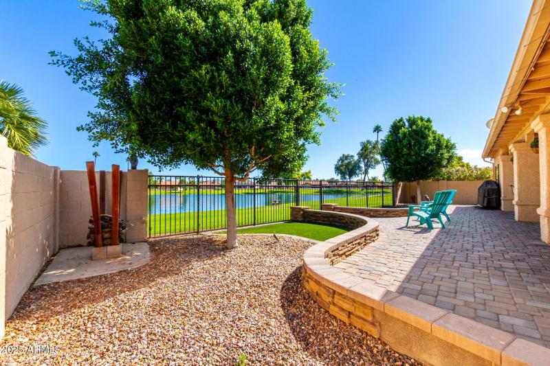 Rear side patio with partial lakeview