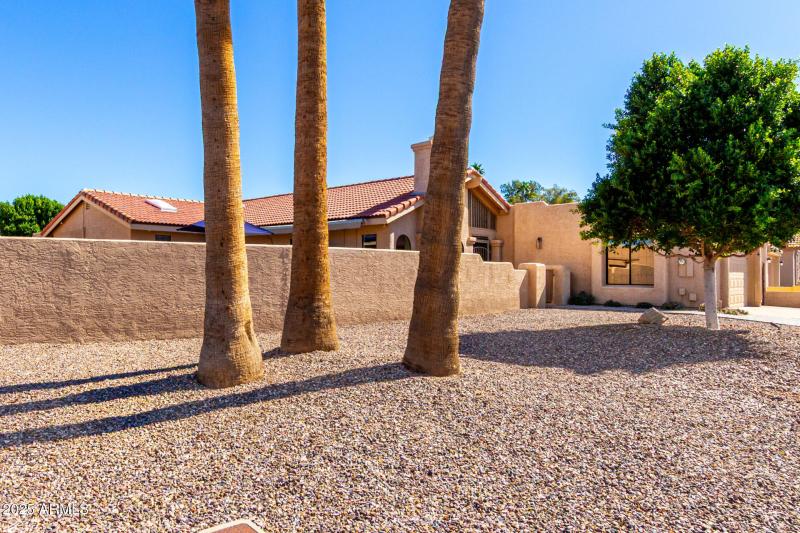 Side showing privacy wall or courtyard
