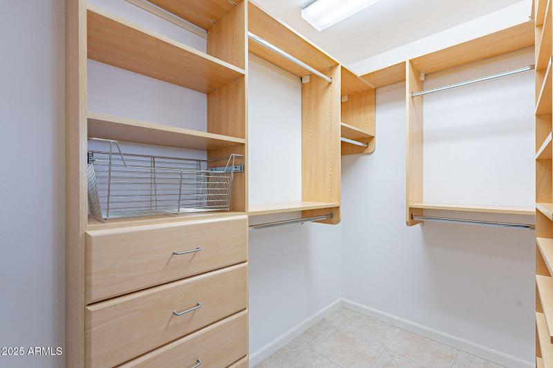 Primary Closet with Organization Shelves