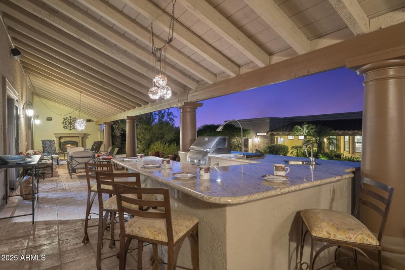 Huge covered Patio w/Kitchen & Fireplace