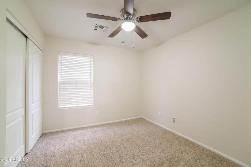1012394.8410 S 49TH LN - Bedroom