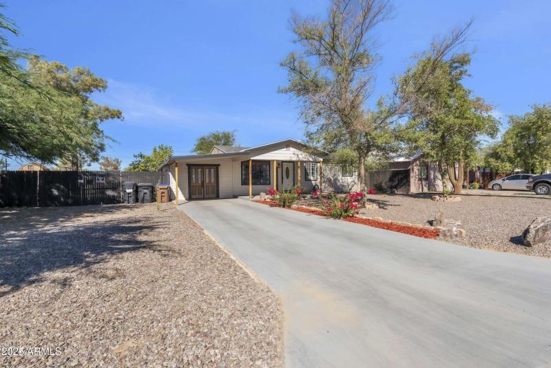 Front of Home with RV Gate