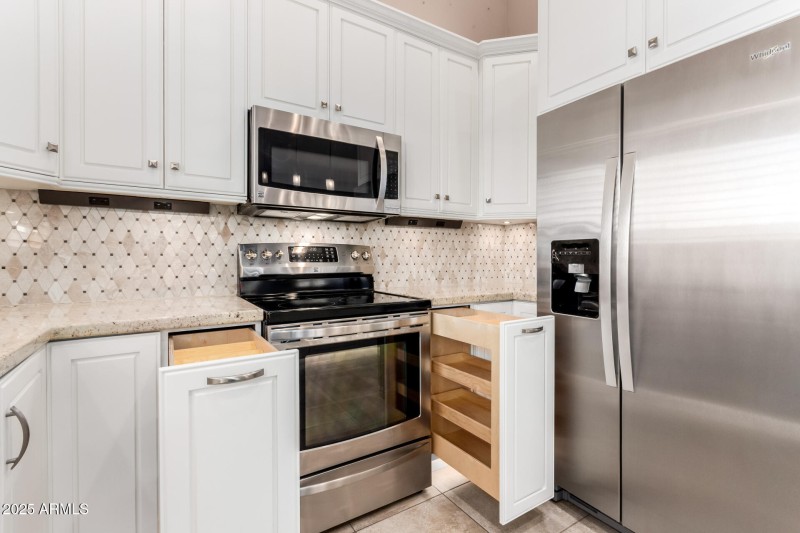 Stainless appliances; roll out shelving