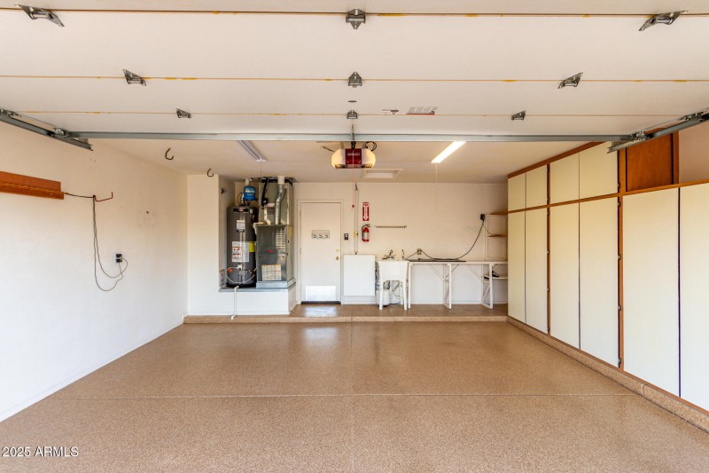 2-car garage w/ built in cabinets