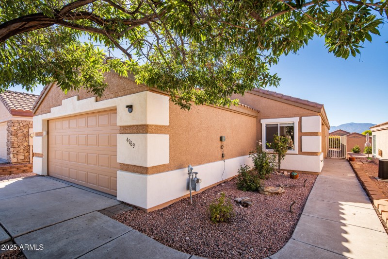FRONT ENTRANCE & 2-CAR GARAGE