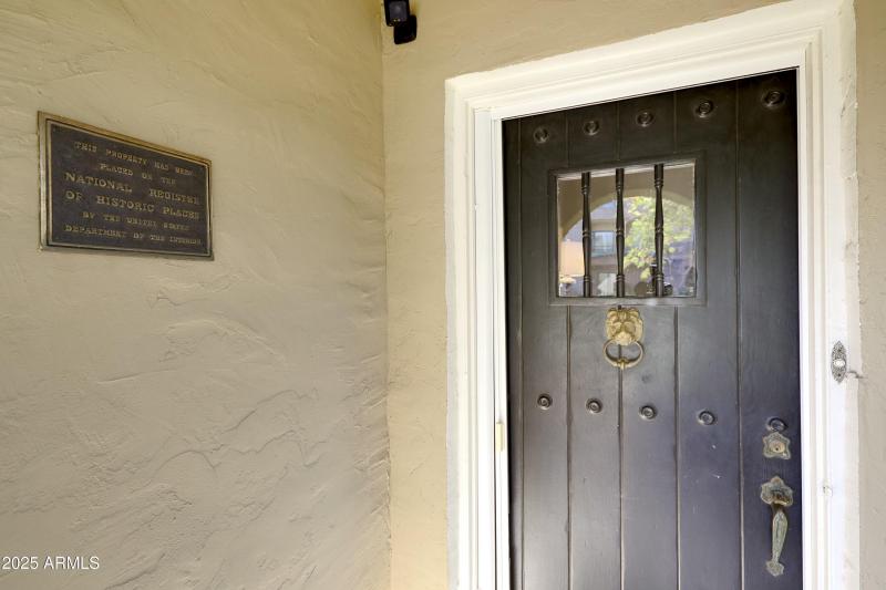 front door and historic plaque