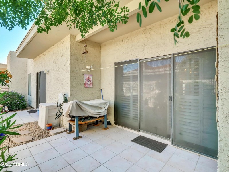 Living room patio open to bedroom patio