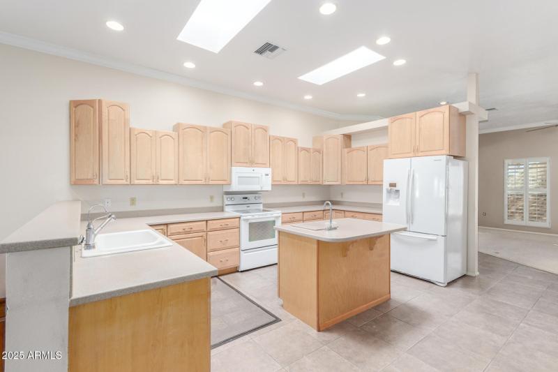 Kitchen has two sinks