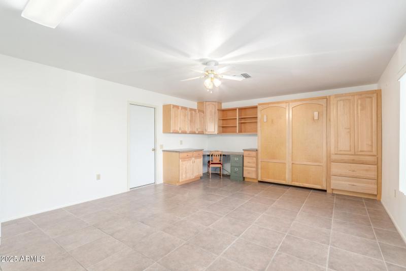 Den/office door to garage on left