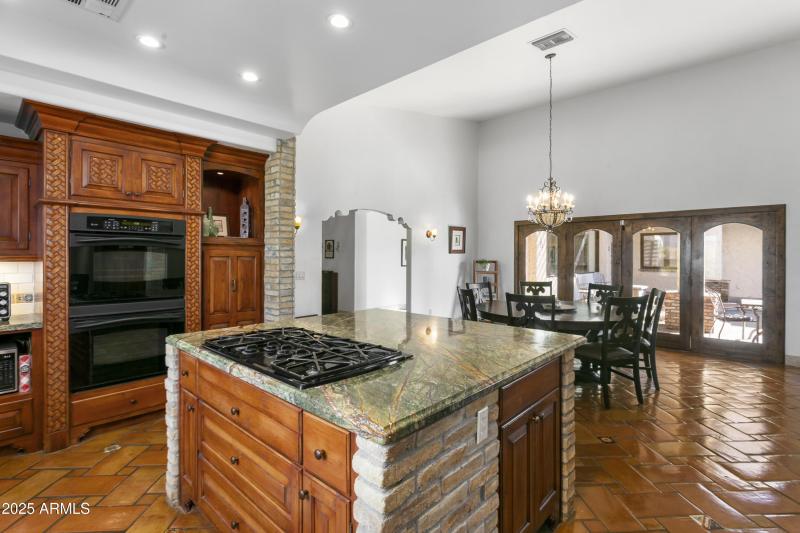 Custom Cabinetry w/ Hand-carved Accents