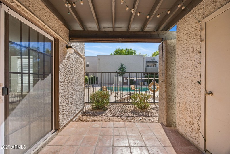 Sunny Patio with Pool Views