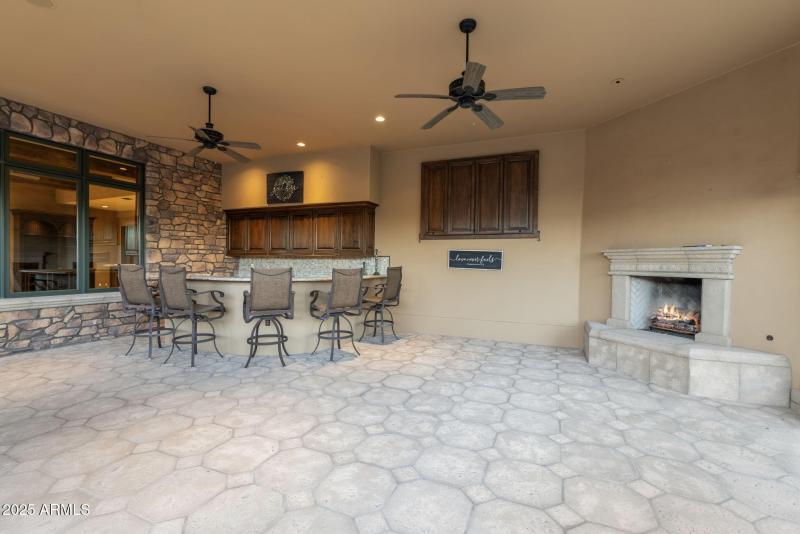 Covered Patio with a fireplace
