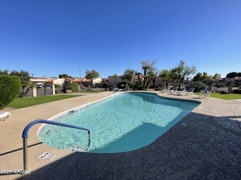 SPACIOUS DECK SURROUNDS POOL