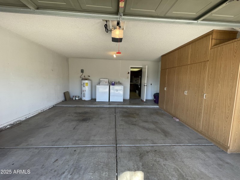 LAUNDRY & LOADS OF CABINETS IN GARAGE