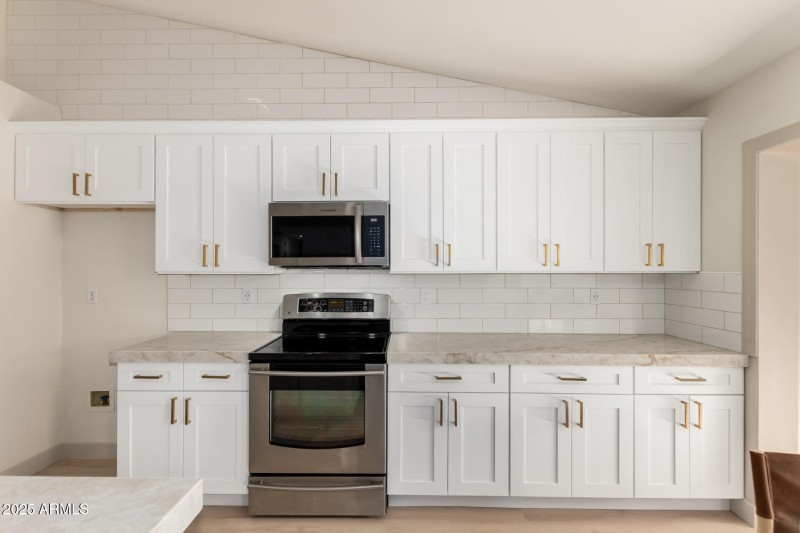 Entire Wall has a Tiled Back Splash