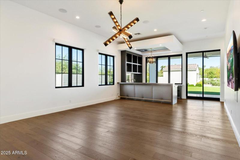 Media room has electronic shades