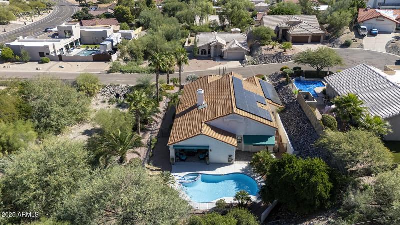 Aerial view of home and lot