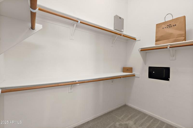 PRIMARY SUITE WALK-IN CLOSET