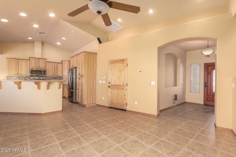 ENTRY INTO THE FAMILY ROOM/KITCHEN