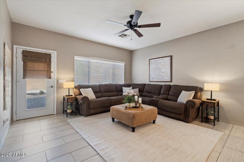 Back living room with pool views