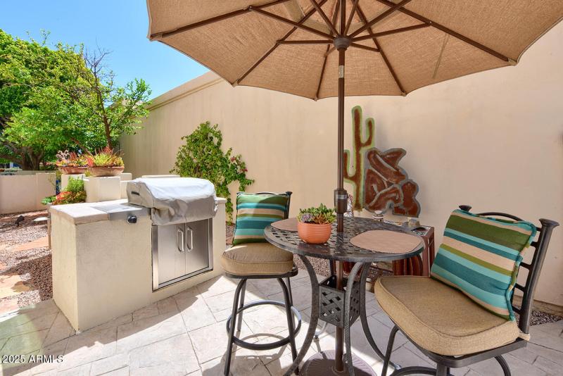 SIDE PATIO OFF KITCHEN W/BBQ