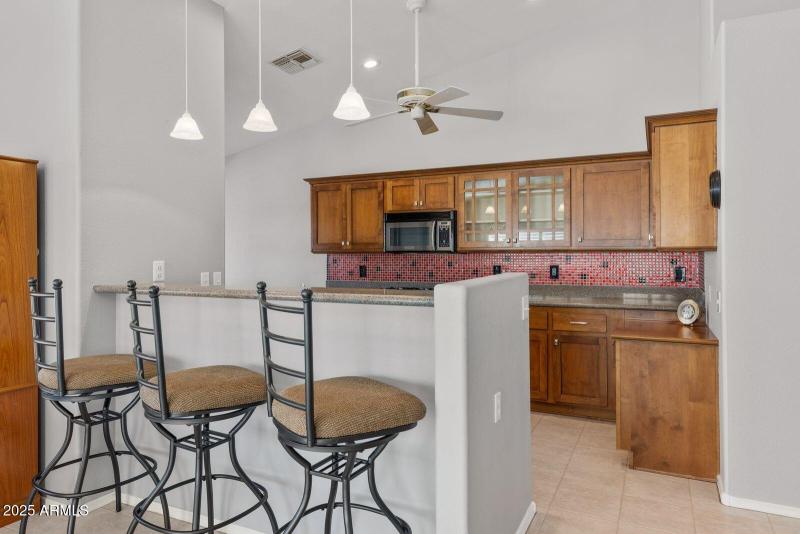 3022 N 148th Ave Reshoot Kitchen from ba