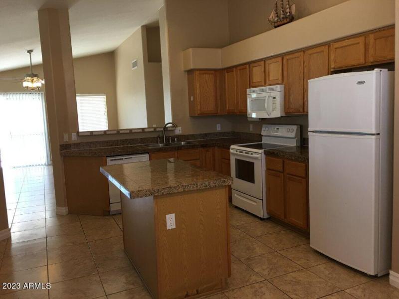 Kitchen with Granite Counter and Island