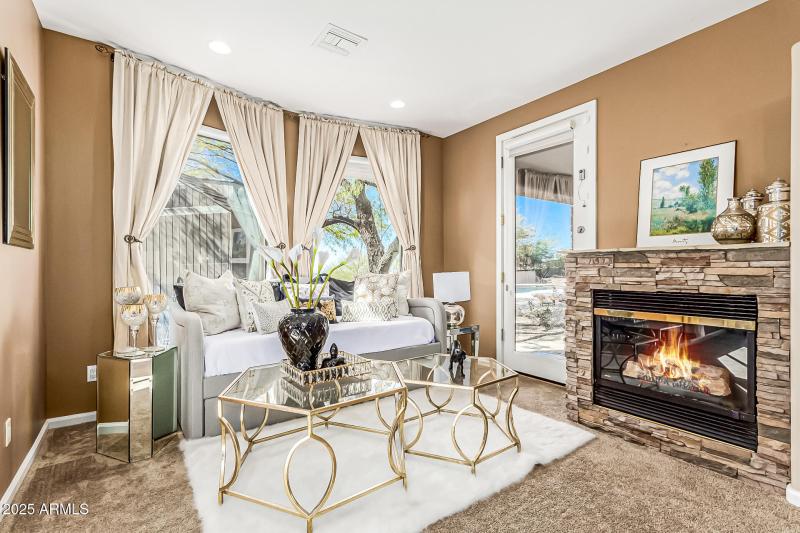 11-3-Primary-Suite-Sitting-Area-Fireplac